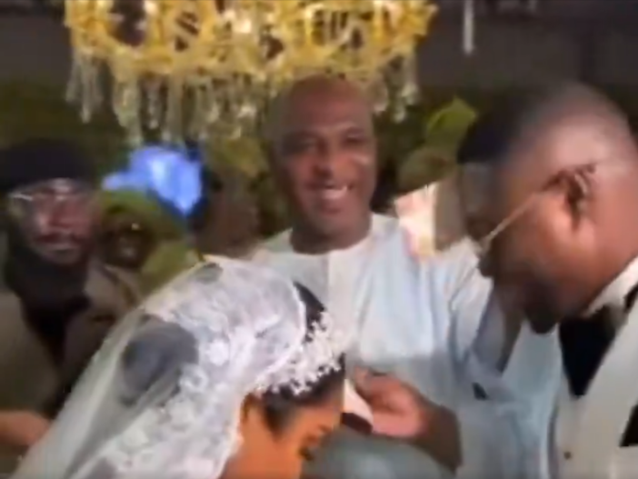 Watch Interior Minister Muntaka Mubarak sprays cash at a wedding