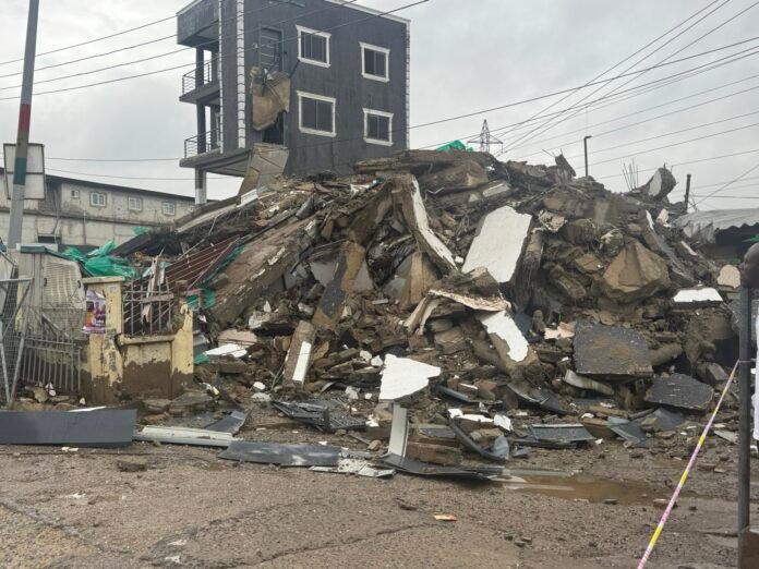 Building collapse adjacent to Melcom Plus ..