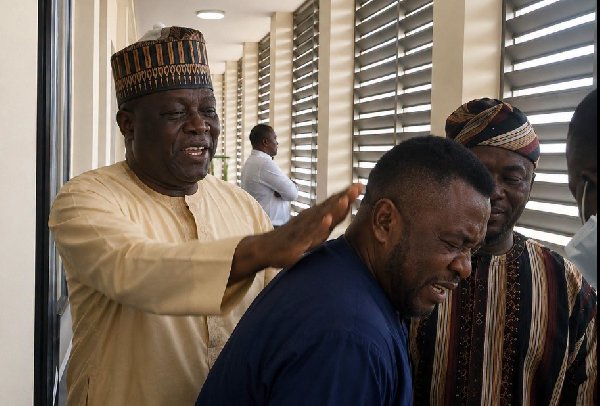 Muslim cleric slaps pastor in handcuffs